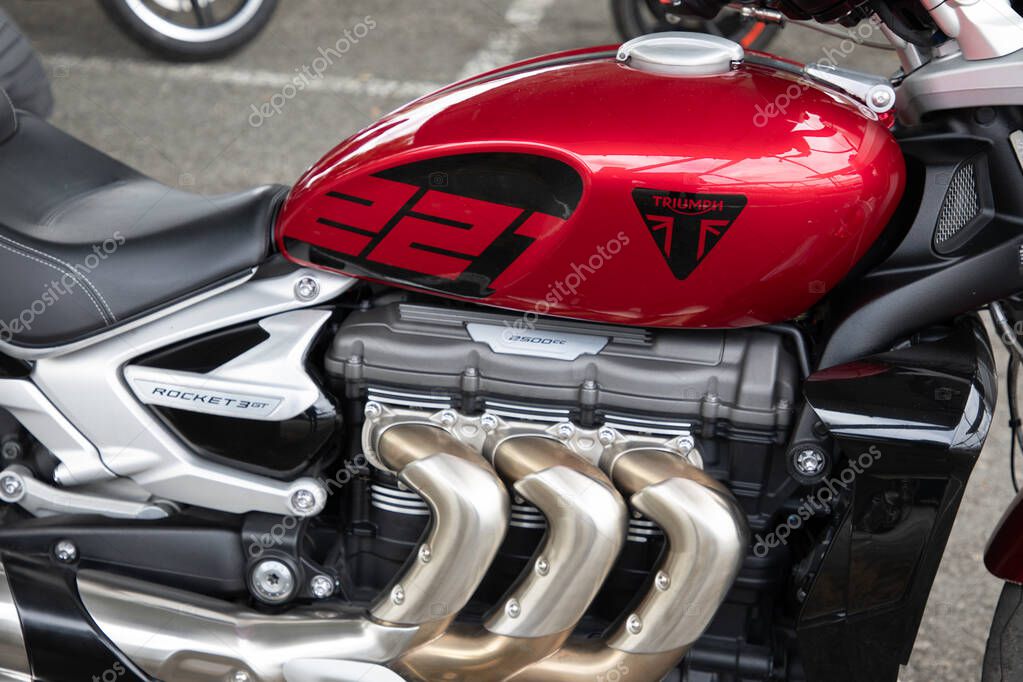 Bordeaux , France - 05 29 2025 : triumph rocket 3 gt 2500 221 roadster motorcycle detail sign text and brand logo on red fuel tank motorbike