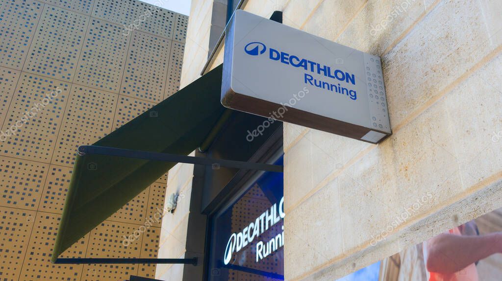 Bordeaux , France - 06 03 2025 : decathlon running text sign and logo brand on wall store French shop of sport goods retailer