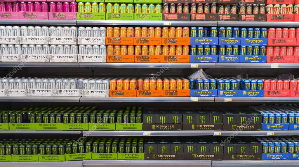 Bordeaux , france -  06 06 2025 : monster energy logo brand and text sign on energy drink tins in store market with ultra juiced zero sugar punch series can
