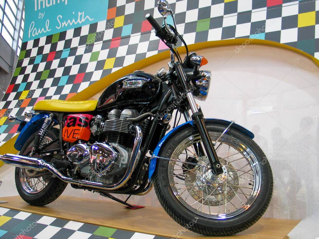 Bordeaux , France -  10 01 2025 : triumph bonneville motorcycle t100 side view with sign text and logo brand on fuel tank on paul smith limited edition of 50 copies motorbike vintage