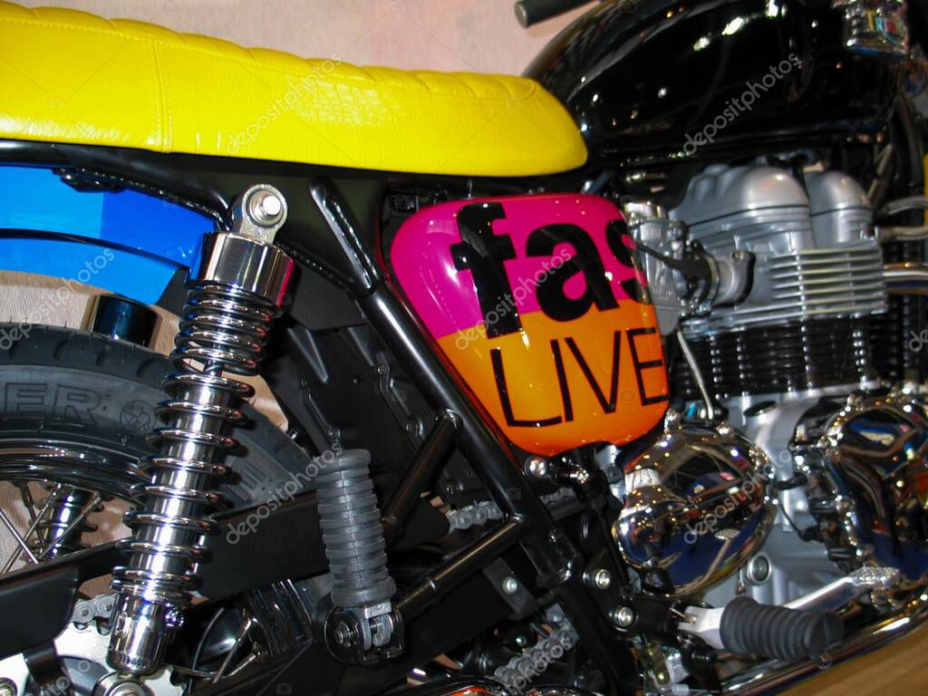 Bordeaux , France - 10 09 2025 : triumph bonneville motorcycle t 100 collector live fast sign text and logo brand on fuel tank on paul smith limited edition of 50 copies
