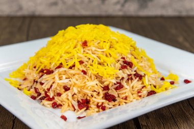 Side dish of basmati rice with mixed berries as an appetizer.