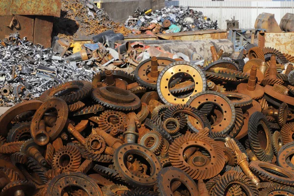 Heaps of sorted metal scrap for recycling.