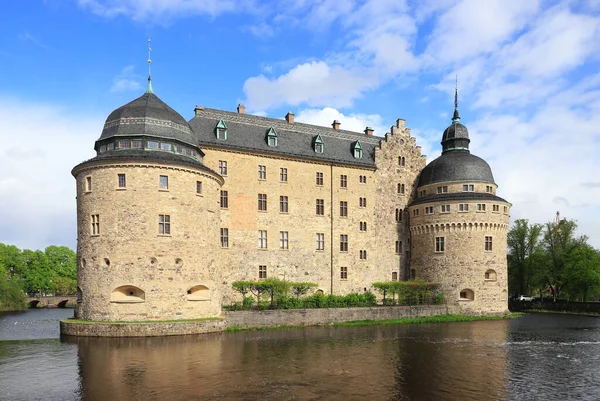 stock image The beautiful Orebro Castle, whose construction began in the 14th century, is surrounded by water in the Swedish province of Narke.