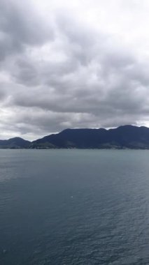 Panoramic view of Sao Sebastiao on a cloudy day from a cruise ship_vertical.