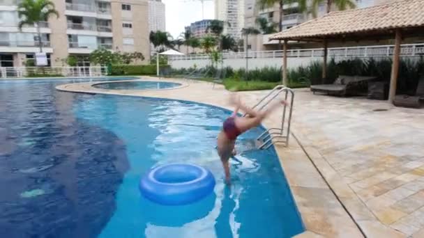 Year Old Child Doing Somersault Land Buoy Swimming Pool_Looping — Stockvideo