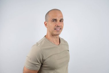 Caucasian, Brazilian man, 48 years old, in the studio showing emotions_25.