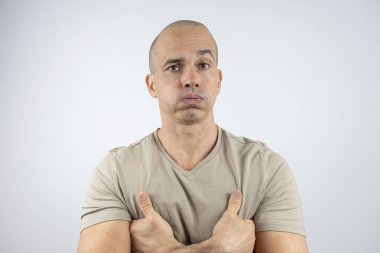 Caucasian, Brazilian man, 48 years old, in the studio showing emotions_disappointment_12. clipart