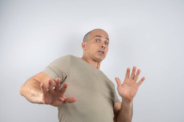 Caucasian, Brazilian man, 48 years old, in the studio showing emotions_astonished_4. clipart