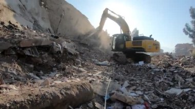Antakya Ali Gaffar Okkan Aveneu, 6. street. Footage by Savas Koseoglu Furniture Showroom, Zeytunlu apartments. Limak Holdings Volunteers and TBMM Fire Fighter was working on A blok.