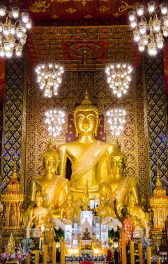 three gold giant buddha statue in church
