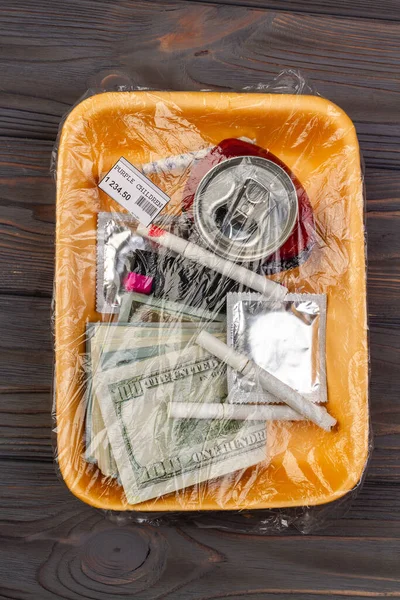 Top View Teenage Stuff Wrapped Plastic Money Condom Cigarettes — Stock Photo, Image