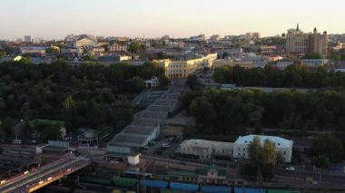 Odesa, Ukraine - 08.08.2020: View from drone of urban city scape. Odessa Potemkin stairs. Railways and trees.
