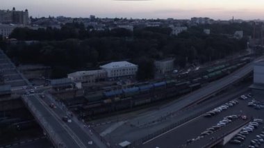 Odesa, Ukraine - 08.08.2020: Drone view of road infrastructure in the evening. Twilight sunset sky. Odessa city with no electricity.