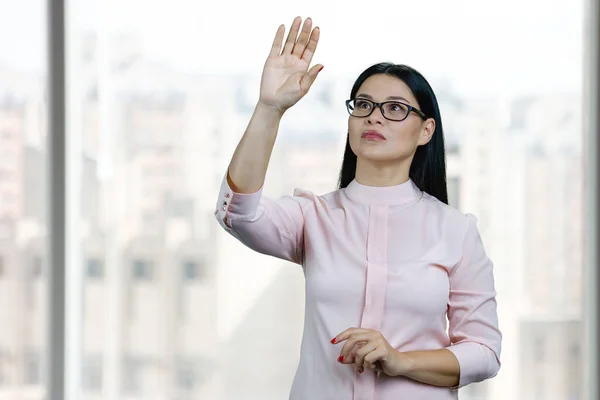 Young Asian Business Woman Touching Invisible Virtual Screen Her Hand — Stok fotoğraf