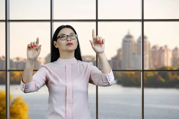 Young Asian Woman Interacting Invisible Virtual Screen Both Hands Checkered — Foto Stock