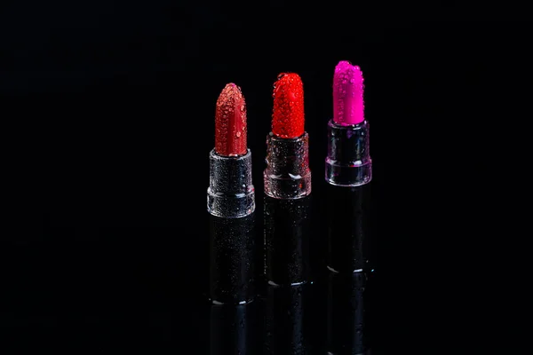 Set Three Lipsticks Isolated Black Background Red Purple Colors — Stock Photo, Image
