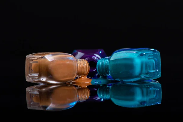 Multicolored Nail Polish Bottles Reflective Surface Mixing Lacquer Paint Different — Foto Stock