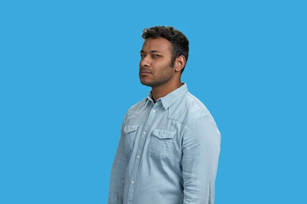 Portrait Young Indian Man Looks Suspisiously Isolated Blue — Stock Photo, Image