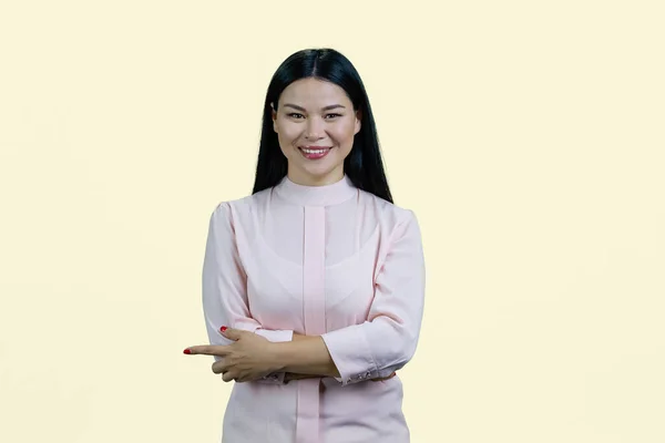 Portrait Happy Cheerful Asian Woman Folded Arms Pointing Right Isolated — Stock Photo, Image