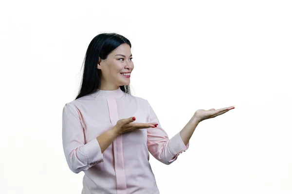 Smiling Young Cheerful Asian Woman Showing Copy Space Both Hands — Stock Photo, Image