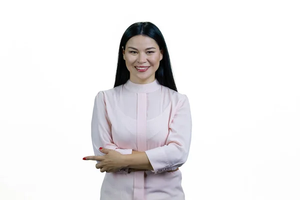 Portrait Young Asian Woman Crossed Arms Pointing Something Isolated White — Stock Photo, Image