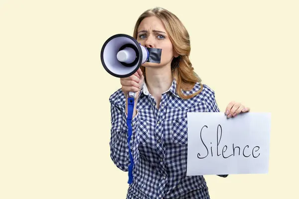 Young Blonde Woman Struggles Speak Megaphone Because Mouth Taped Isolated — Stock Photo, Image