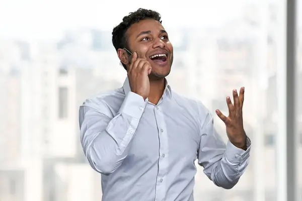 Happy Emotional Man Wearing White Shirt Talking Futuristic Phone Positive — Stock Photo, Image