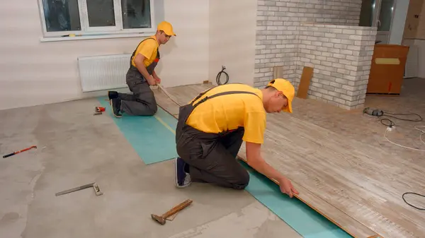 Laying Floorboard Team Builders Make Renovation Apartment Laying Parquet — Stock Photo, Image