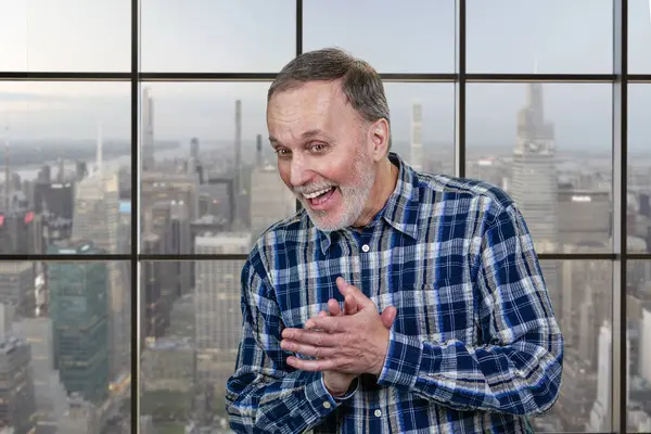 Portrait Cheerful Smiling Senior Businessman Rubbing His Hands Windows Cityscape ストック写真