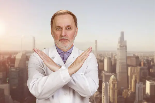 Happy Senior Medic Doctor White Coat Shows Reject Sign Urban — Stock Photo, Image