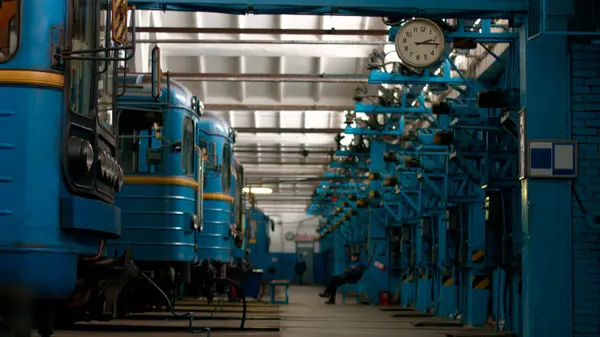 stock image Employees work in a railway depot. Public transport under repair. Depot for metro trains.