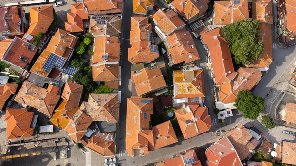 Top view Aerial view of the tile roofs of old Nessebar and parking place, ancient city on the Black Sea coast of Bulgaria, UNESCO World Heritage