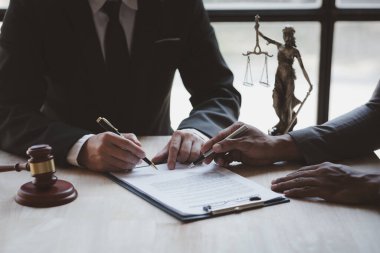 Attorneys or lawyers are advising clients in defamation cases, they are collecting evidence to bring charges against the parties for damages. The concept of defamation case counseling.