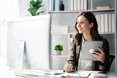 Beautiful woman running a company, a businesswoman who founded a new generation of startup companies, with management run by female leaders, female bosses. Business administration concept.