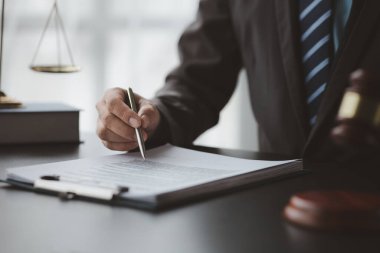 Attorneys or lawyers are advising clients in defamation cases, they are collecting evidence to bring charges against the parties for damages. The concept of defamation case counseling.