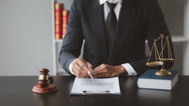 Attorneys or lawyers are advising clients in defamation cases, they are collecting evidence to bring charges against the parties for damages. The concept of defamation case counseling.