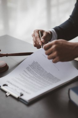 Attorneys or lawyers are advising clients in defamation cases, they are collecting evidence to bring charges against the parties for damages. The concept of defamation case counseling.