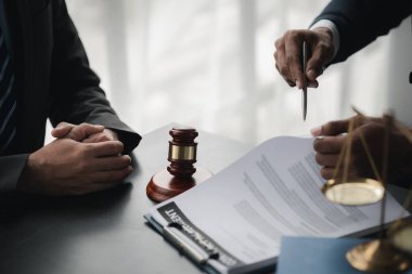 Attorneys or lawyers are advising clients in defamation cases, they are collecting evidence to bring charges against the parties for damages. The concept of defamation case counseling.