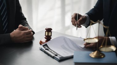 Attorneys or lawyers are advising clients in defamation cases, they are collecting evidence to bring charges against the parties for damages. The concept of defamation case counseling.