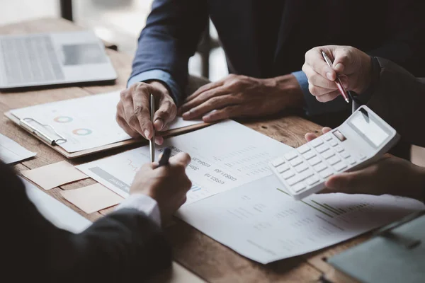 stock image Groups of people joining in discussions, business meetings, startup company sales team meetings, brainstorming and summary of company performance. Business strategy management concept.