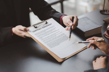 Attorneys or lawyers are advising clients in defamation cases, they are collecting evidence to bring charges against the parties for damages. The concept of defamation case counseling.