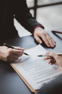 Attorneys or lawyers are advising clients in defamation cases, they are collecting evidence to bring charges against the parties for damages. The concept of defamation case counseling.