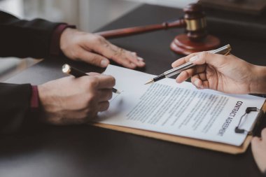 Attorneys or lawyers are advising clients in defamation cases, they are collecting evidence to bring charges against the parties for damages. The concept of defamation case counseling.