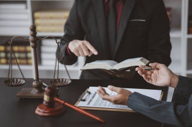 Attorneys or lawyers are advising clients in defamation cases, they are collecting evidence to bring charges against the parties for damages. The concept of defamation case counseling.