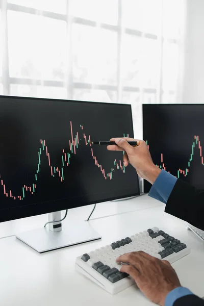 Stock investor with stock market graph screen, stock fluctuation analysis, business man trading stocks for profit, stock market fluctuation graph screen, profit trading analysis.