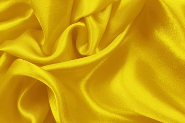 Sarı altın kumaş dokusu arka plan, ipek ya da keten desenlerin ayrıntıları.