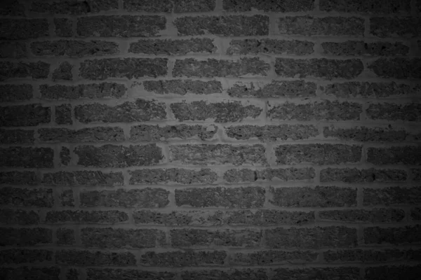 Black brick wall texture background with vintage style for design art work.