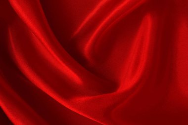 Koyu kırmızı kumaş dokusu arka plan, ipeğin veya keten deseninin ayrıntıları.