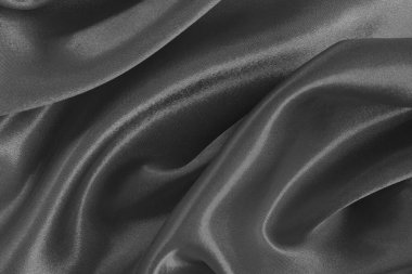 Black grey fabric texture background, detail of silk or linen pattern.